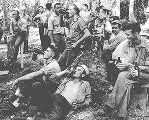 Mog Mog, a tiny island of Ulithi Atoll, became known as "Beer Island" for tens of thousands of enlisted men who would drink over 7.6 million cans of beer and soft drinks on its sandy beaches. (US Navy photograph Mog Mog, a tiny island of Ulithi Atoll, became known as 'Beer Island' for tens of thousands of enlisted men who would drink over 7.6 million cans of beer and soft drinks on its sandy beaches. (US Navy photograph)