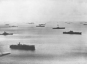 Task Force 58 carriers, battleships, cruisers and destroyers at rest at Majuro Atoll after raids throughout the Central Pacific in February 1944.  (US Navy photograph)